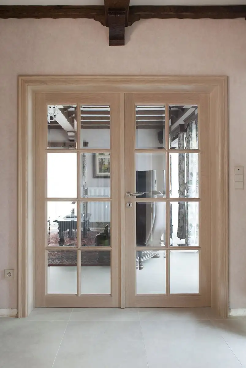 Massief Classic gamma M1 + dubbele deur met glas in Appelterre, gemaakt en geplaatst door Jacobs Binnendeuren